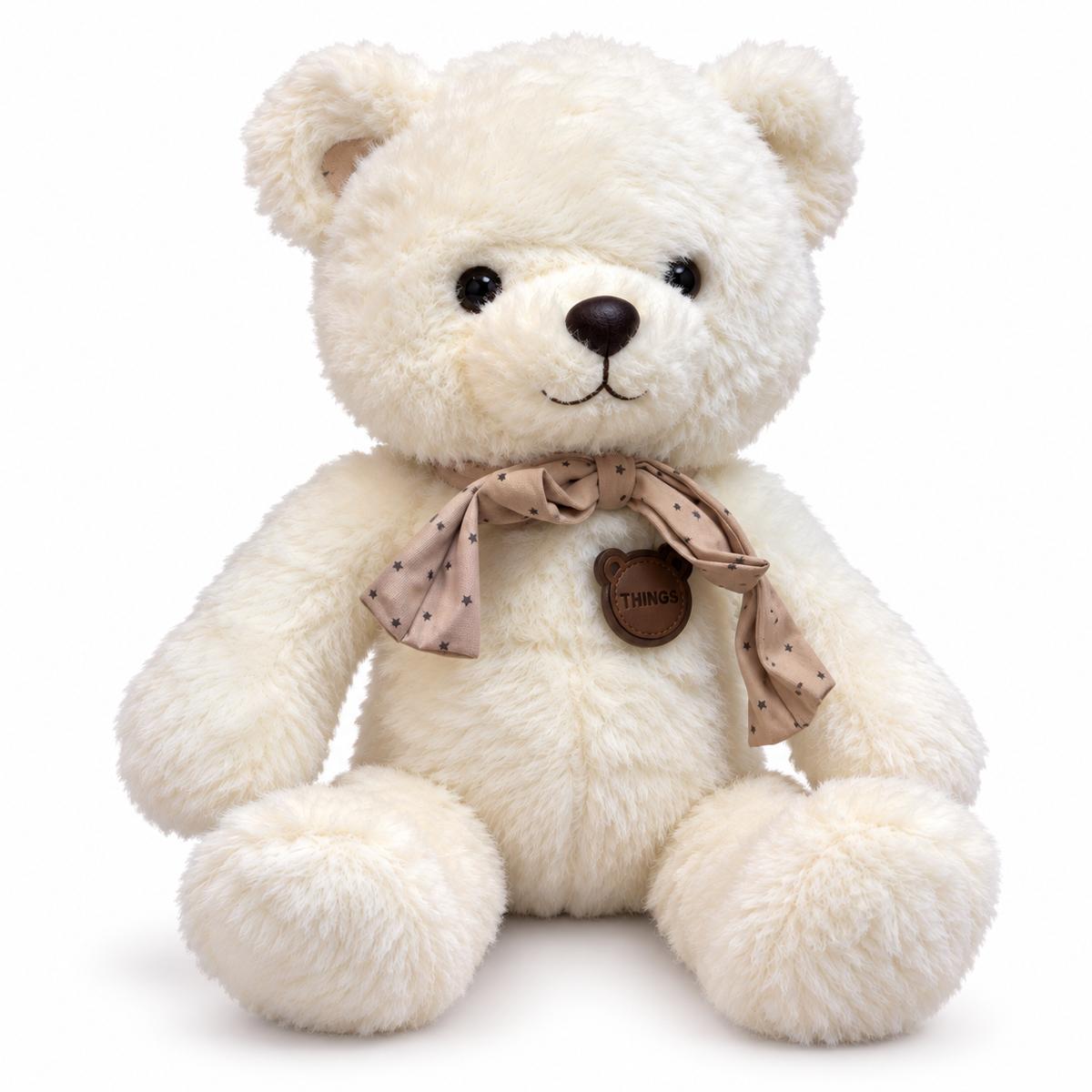 Peluche ours crème avec écharpe étoilée et médaillon